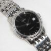 Ladies Omega de Ville Prestige Ref. 566.1050. Automatic movement. Steel case and black dial. Integrated original bracelet.