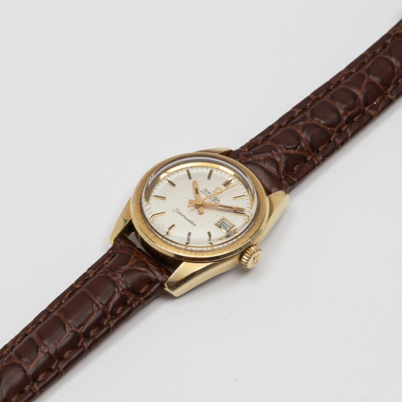 Ladies Omega Seamaster Cosmic from 1969 Ref. 566.013. Gold cap and sparkle dial. Automatic movement.