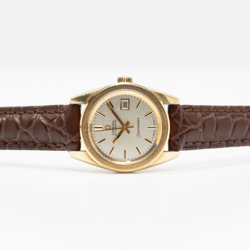 Ladies Omega Seamaster Cosmic from 1969 Ref. 566.013. Gold cap and sparkle dial. Automatic movement.