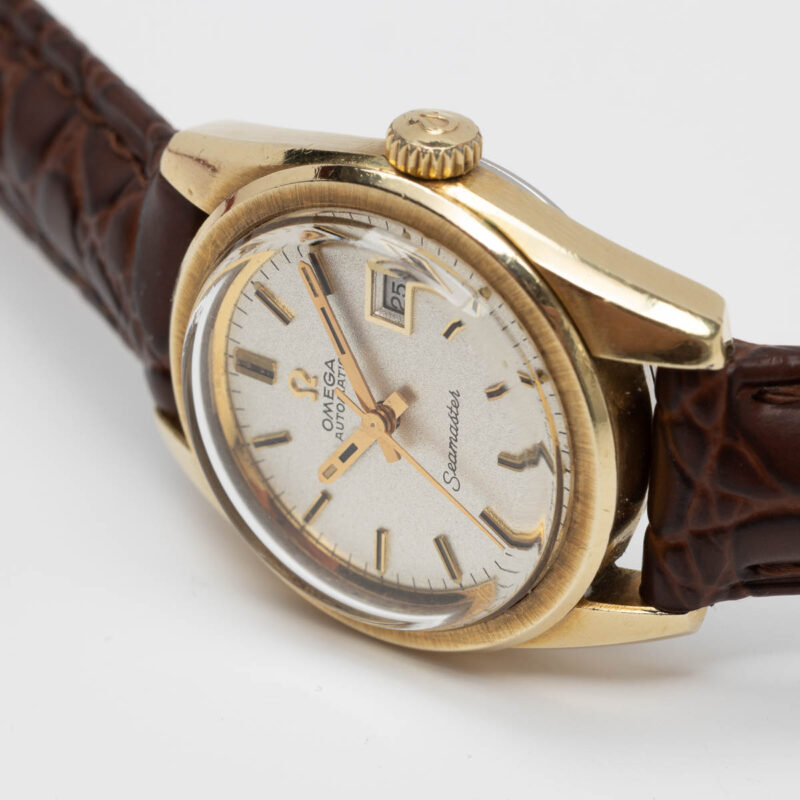Ladies Omega Seamaster Cosmic from 1969 Ref. 566.013. Gold cap and sparkle dial. Automatic movement.