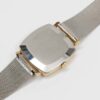 Omega Genève from 1972 Ref. 132.0052. Manual movement. Gold plated square watch. Original mesh bracelet.