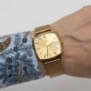 Omega Genève from 1972 Ref. 132.0052. Manual movement. Gold plated square watch. Original mesh bracelet.