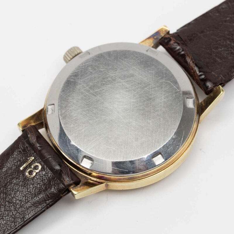 Omega Genève day/date from 1972 Ref. 166.0117. Automatic movement. Gold plated case. White dial.