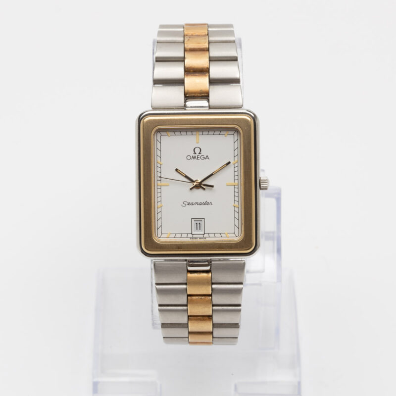 Square Omega Seamaster from 1984 Ref. 396.1004. Quartz movment. Gold bezel and white dial.