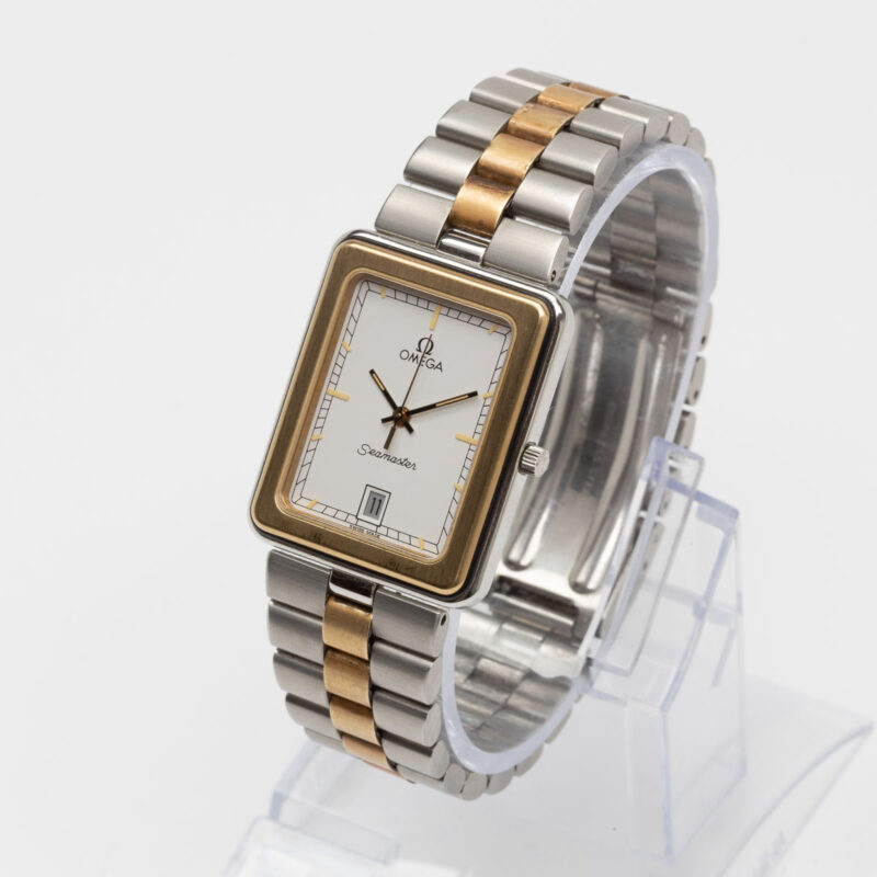 Square Omega Seamaster from 1984 Ref. 396.1004. Quartz movment. Gold bezel and white dial.