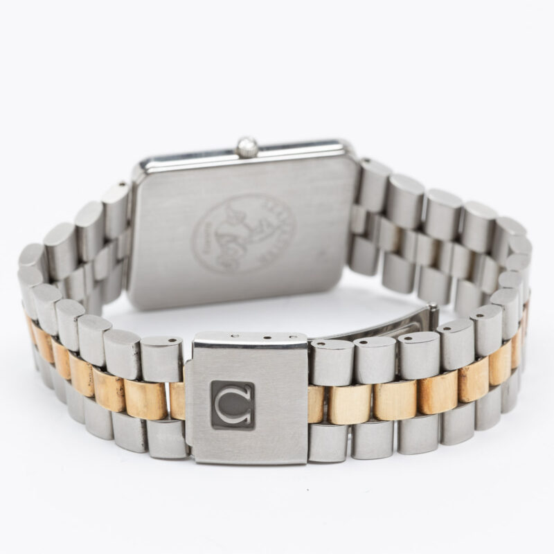 Square Omega Seamaster from 1984 Ref. 396.1004. Quartz movment. Gold bezel and white dial.