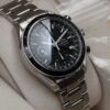 Omega Speedmaster triple calendar Ref. 3520.50. Automatic movement. Back dial and black bezel.