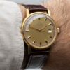 Vintage gold plated Omega date Ref. 166.0098. Automatic movement. Dial with ring.