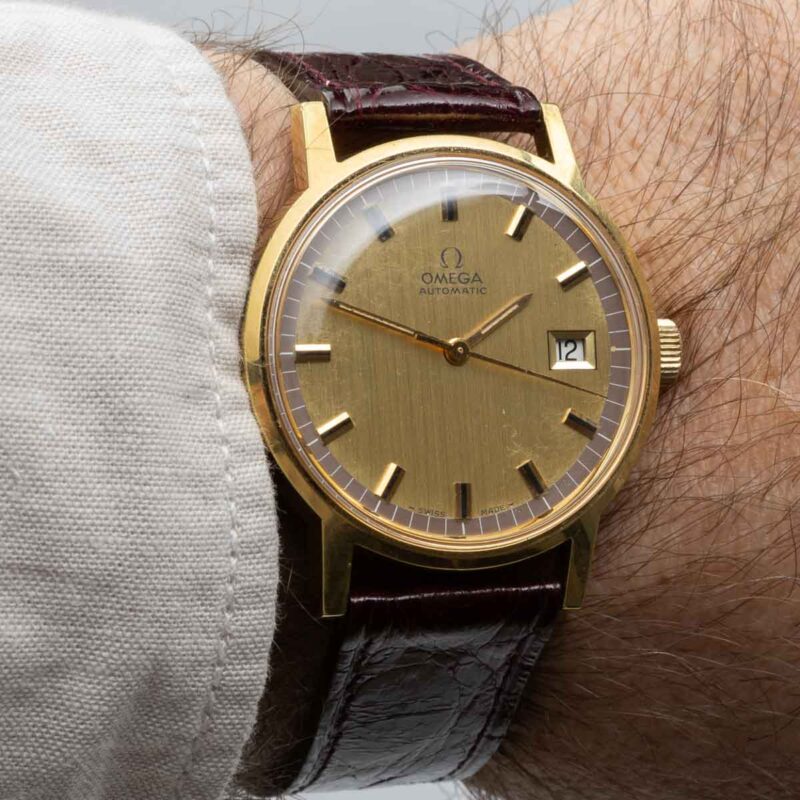 Vintage gold plated Omega date Ref. 166.0098. Automatic movement. Dial with ring.