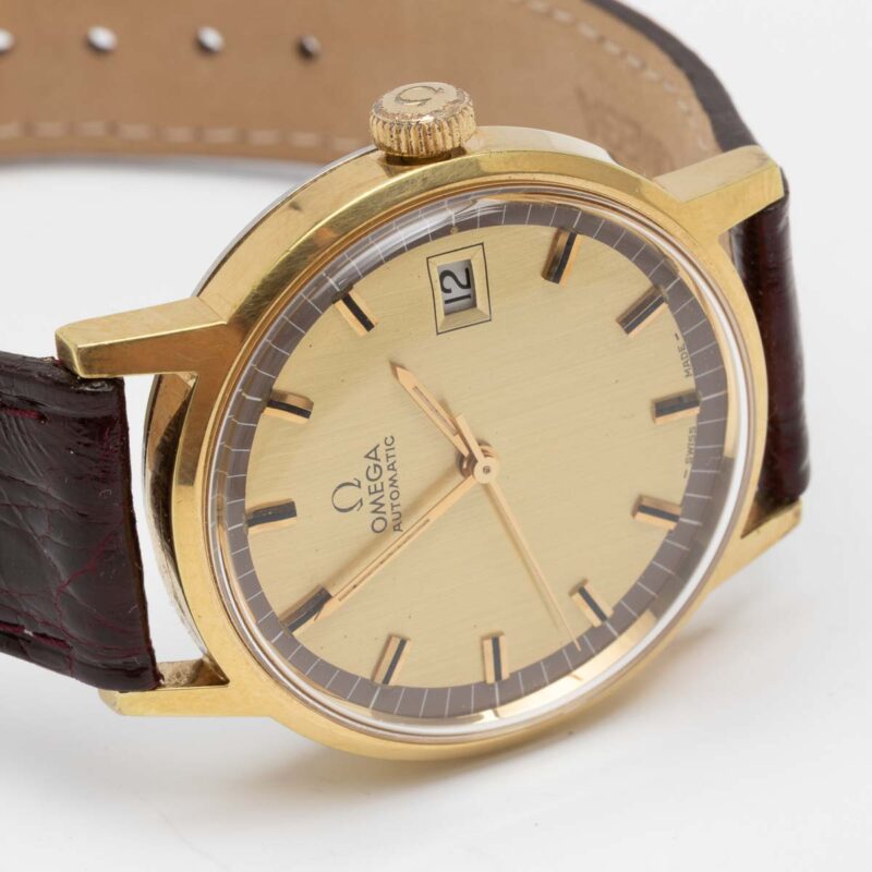 Vintage gold plated Omega date Ref. 166.0098. Automatic movement. Dial with ring.