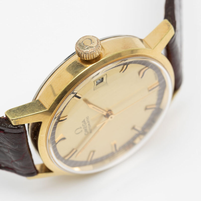 Vintage gold plated Omega date Ref. 166.0098. Automatic movement. Dial with ring.