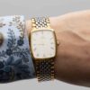 Omega de Ville from 1990s Ref. 3950876. Quartz movement. Gold on steel. Roman indexes on white dial.