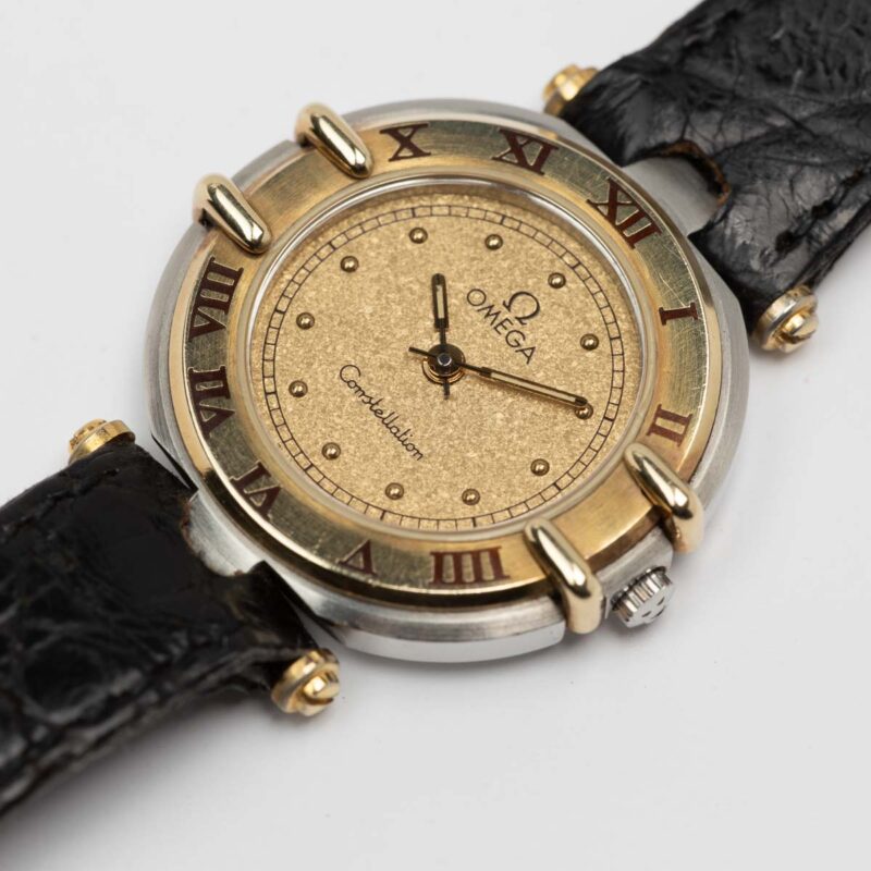 Ladies Omega Constellation Manhattan Cal. 1455 Ref. 595.1080. From 1989. Quartz movment. Gold bezel. Steel case. Sparkle dial.