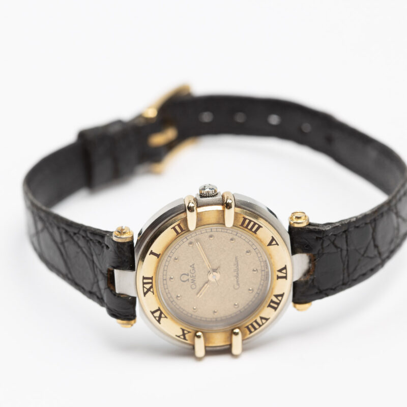 Ladies Omega Constellation Manhattan Cal. 1455 Ref. 595.1080. From 1989. Quartz movment. Gold bezel. Steel case. Sparkle dial.