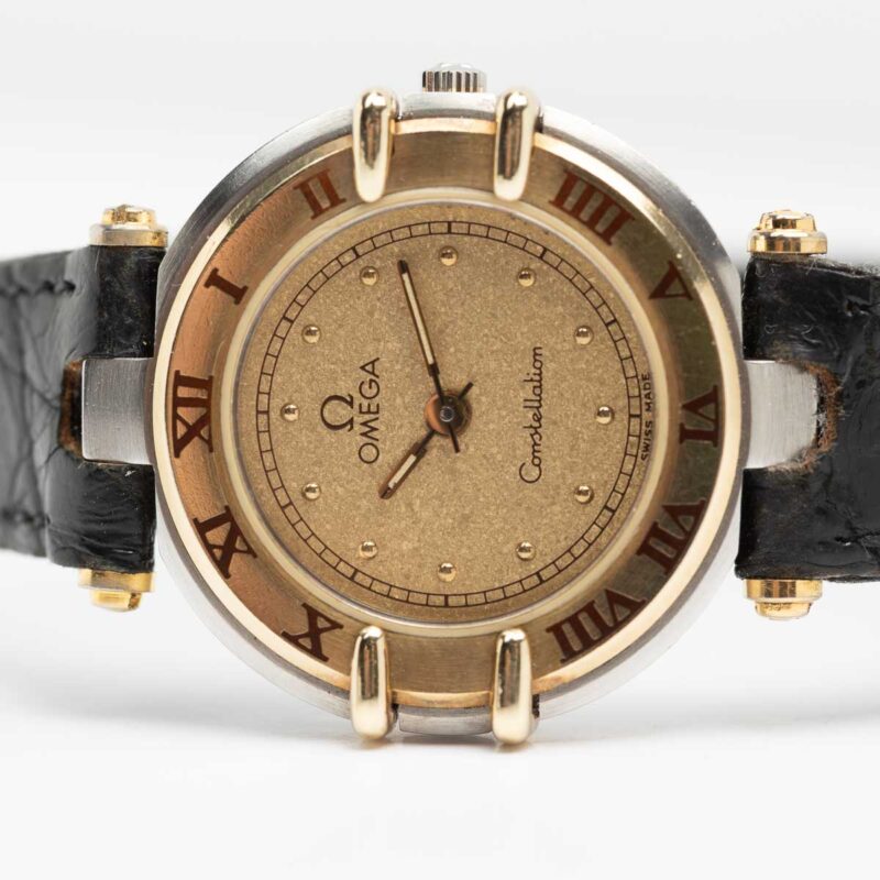 Ladies Omega Constellation Manhattan Cal. 1455 Ref. 595.1080. From 1989. Quartz movment. Gold bezel. Steel case. Sparkle dial.
