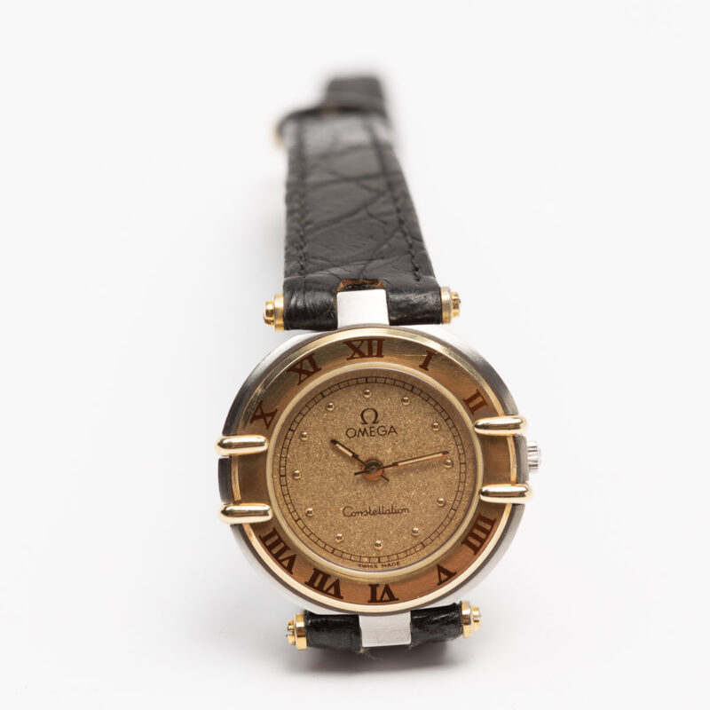 Ladies Omega Constellation Manhattan Cal. 1455 Ref. 595.1080. From 1989. Quartz movment. Gold bezel. Steel case. Sparkle dial.