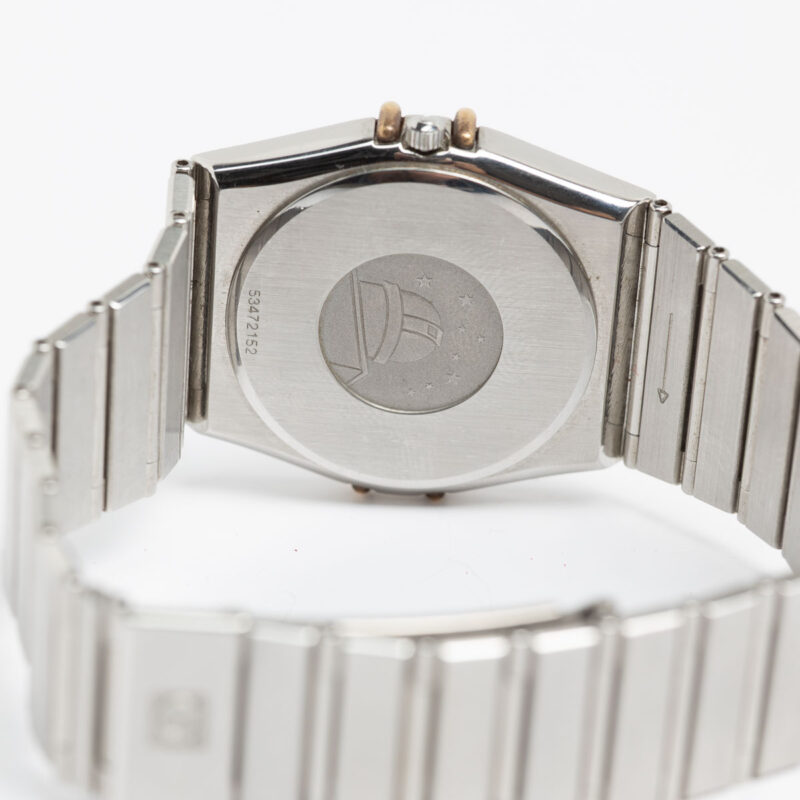Omega Constellation Manhattan date Cal. 1438 Ref. 3961070. Gold bezel. Quartz movment.