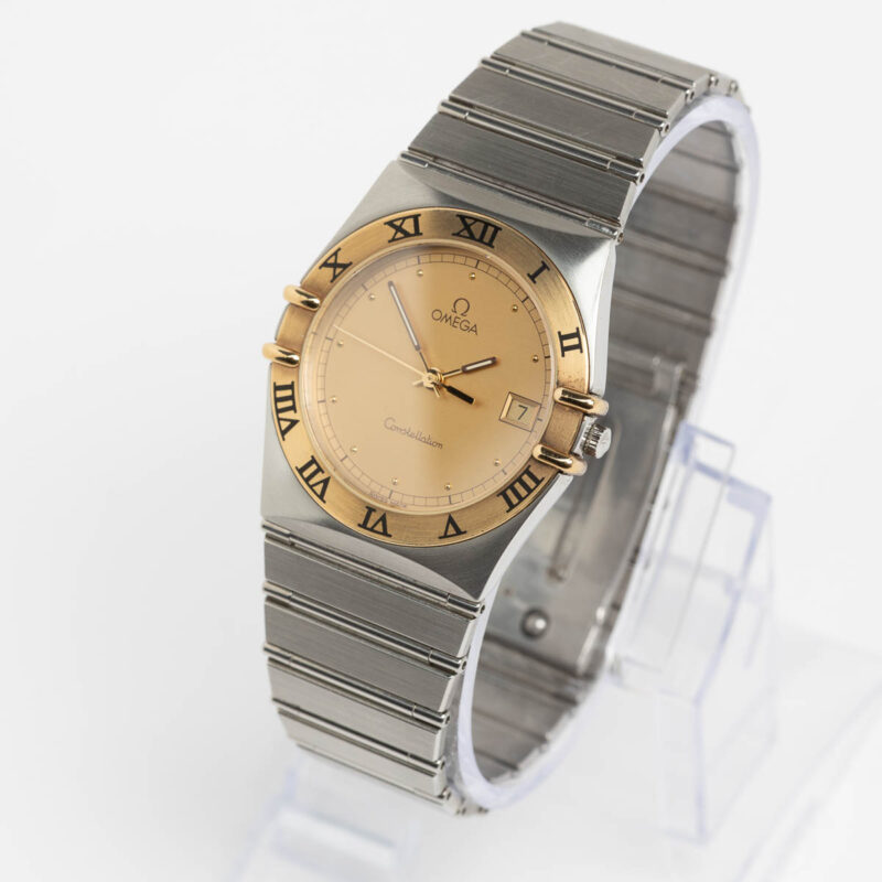 Omega Constellation Manhattan date Cal. 1438 Ref. 3961070. Gold bezel. Quartz movment.