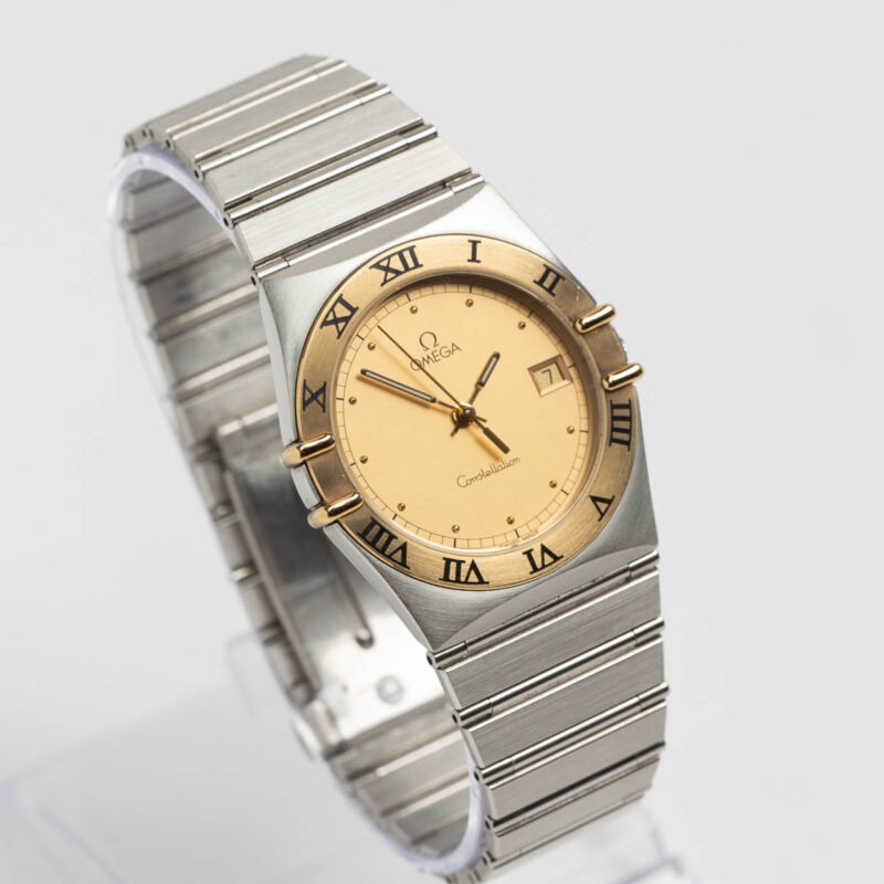 Omega Constellation Manhattan date Cal. 1438 Ref. 3961070. Gold bezel. Quartz movment.