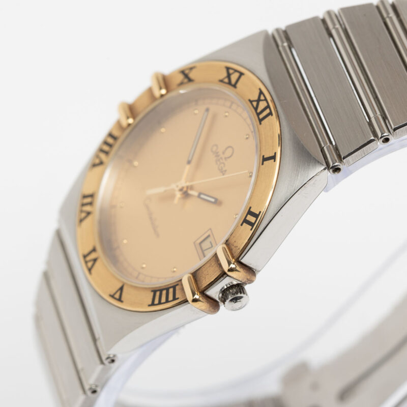 Omega Constellation Manhattan date Cal. 1438 Ref. 3961070. Gold bezel. Quartz movment.