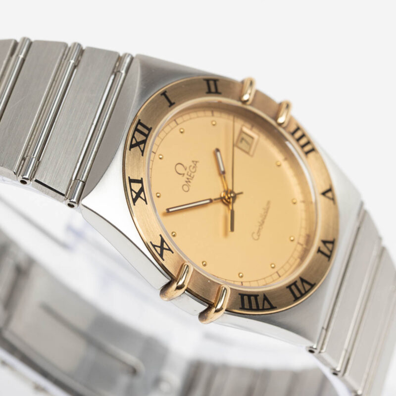 Omega Constellation Manhattan date Cal. 1438 Ref. 3961070. Gold bezel. Quartz movment.