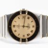 Omega Constellation Manhattan date Cal. 1431 Ref. 1980140. Quartz. Gold bezel.