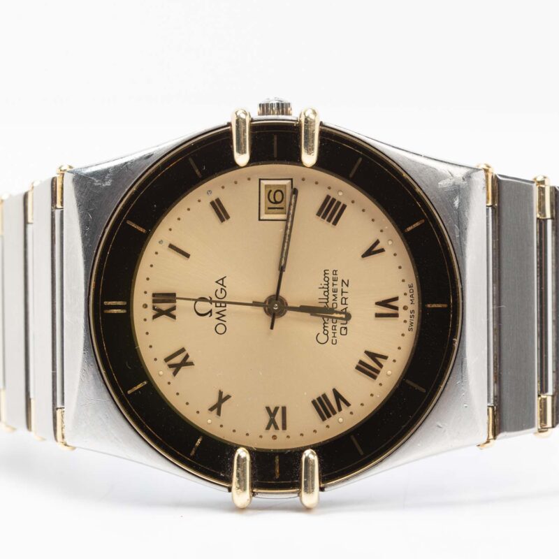 Omega Constellation Manhattan date Cal. 1431 Ref. 1980140. Quartz. Gold bezel.
