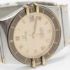 Omega Constellation Manhattan date Cal. 1431 Ref. 1980140. Quartz. Gold bezel.