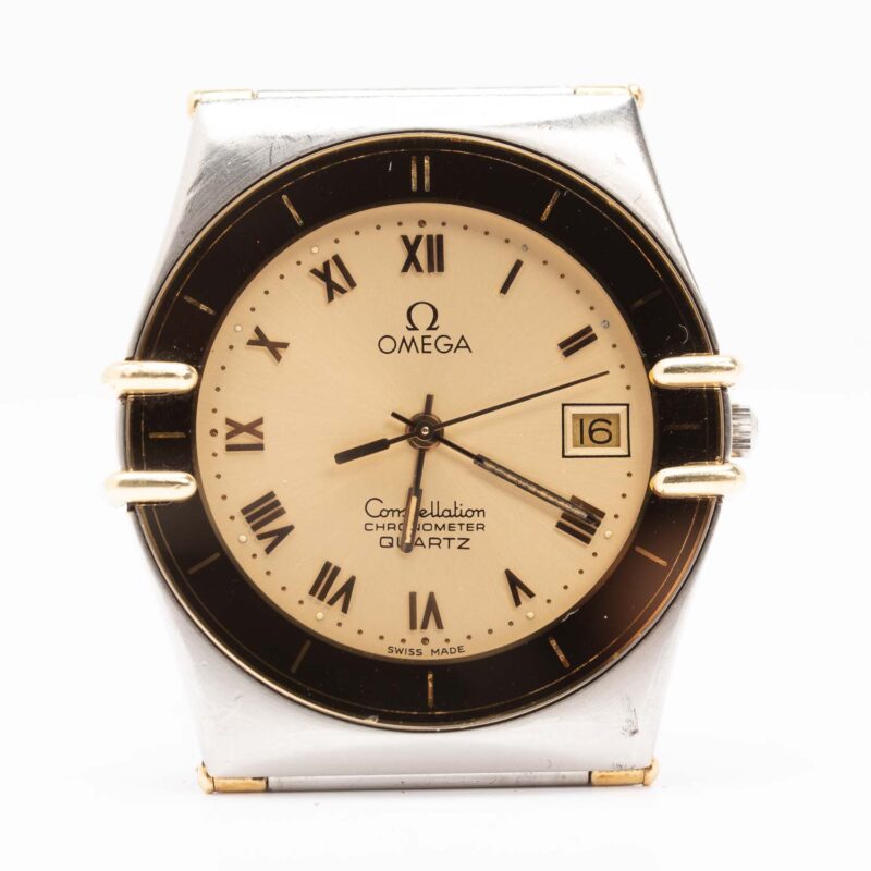 Omega Constellation Manhattan date Cal. 1431 Ref. 1980140. Quartz. Gold bezel.